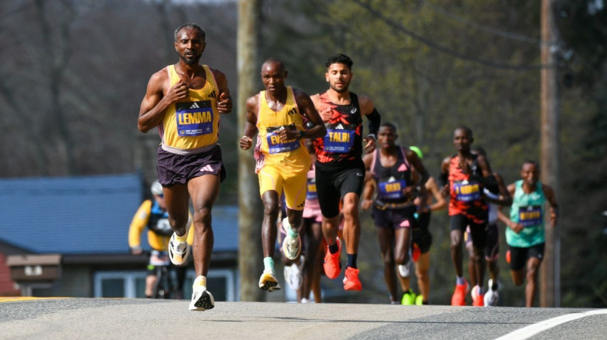 Sisay Lemma of Ethiopia runs in the lead pack of runners of the men's division of the 128th Boston Marathon 