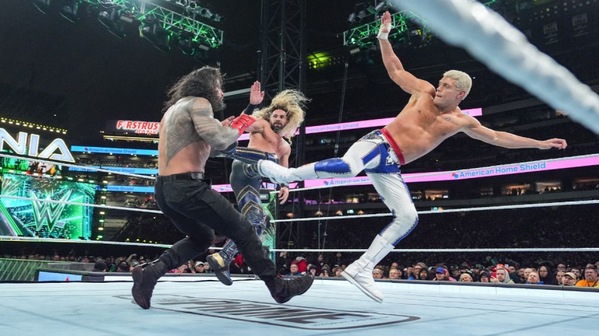 Roman Reigns in action against Seth Rollins and Cody Rhodes during Night One of WrestleMania 40