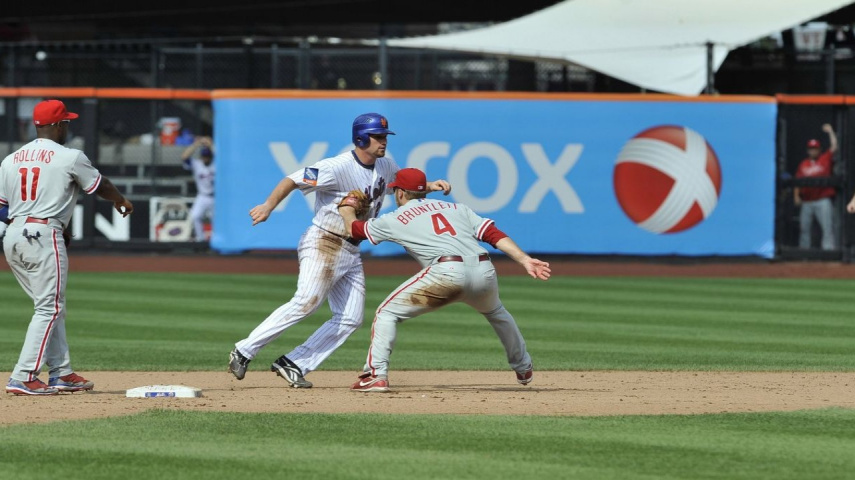 Second baseman Eric Bruntlett #4 of the Philadelphia Phillies ends the game with an unassisted triple play 