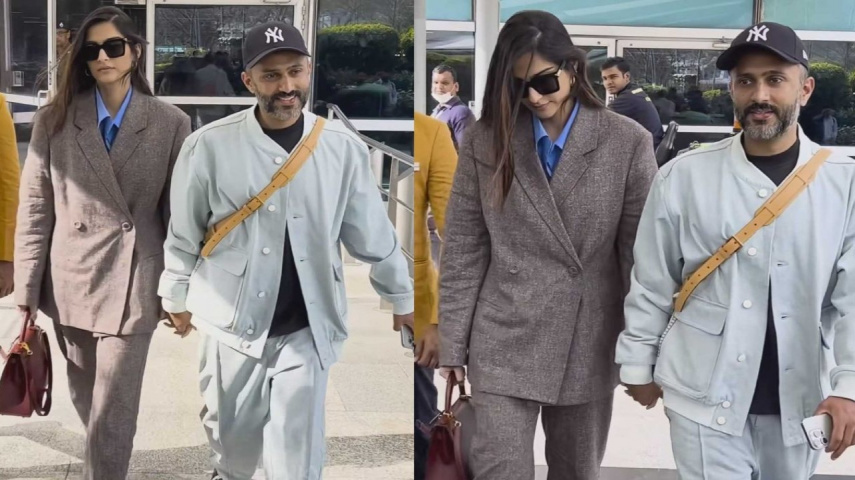 WATCH: Neerja actress Sonam Kapoor walks hand-in-hand with hubby Anand Ahuja as they touch down Delhi airport