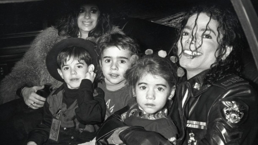 Michael Jackson with his three kids