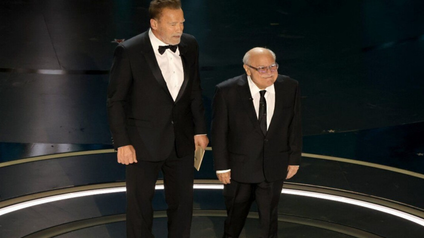 Arnold Schwarzenegger and Danny DeVito mock Michael Keaton during 2024 Oscars