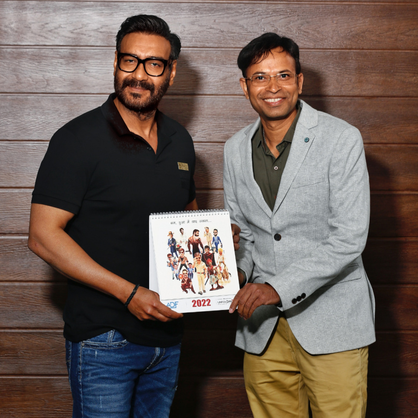 EXCLUSIVE: Ajay Devgn launches 2022 calendar by cartoonist Manoj Sinha featuring his 12 screen characters